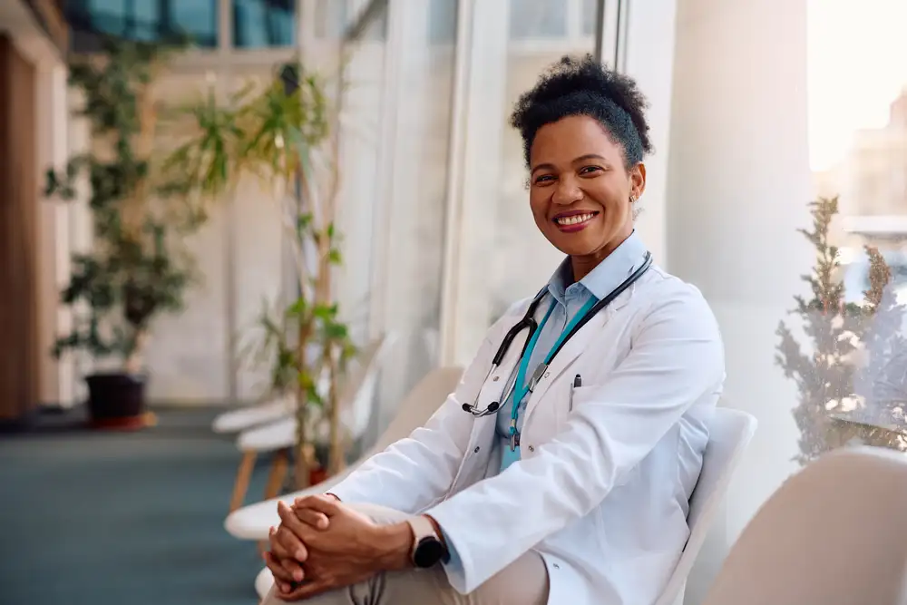 Wellness doctor consulting a patient in Arlington, TX to improve overall health